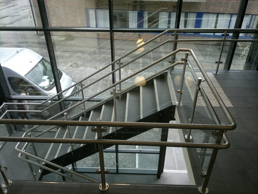 Stairs and entresol glass railings